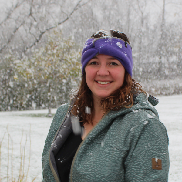 Model Wearing Adult High Piled Fleece Knotted Headband in Purple