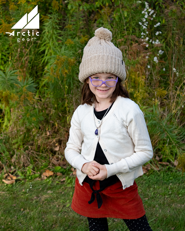 Model Wearing Adult Acrylic Ribbed Cuff with Matching Pom in Tan