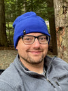 Model Wearing Adult Fleece Cap in Blue
