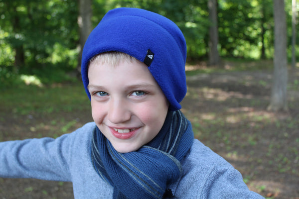 Model Wearing Child Fleece Cap in Blue