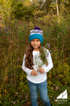 Model Wearing Child Specialty Hat in Teal and Purple Chevron with Pom