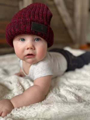 Model Wearing Infant Acrylic Ribbed Cuff in Red and Black
