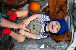 Model Wearing Infant Fleece Cap in Blue