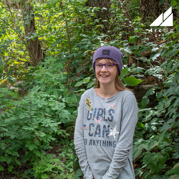 Model Wearing Child Acrylic/Wool Beanie in Purple